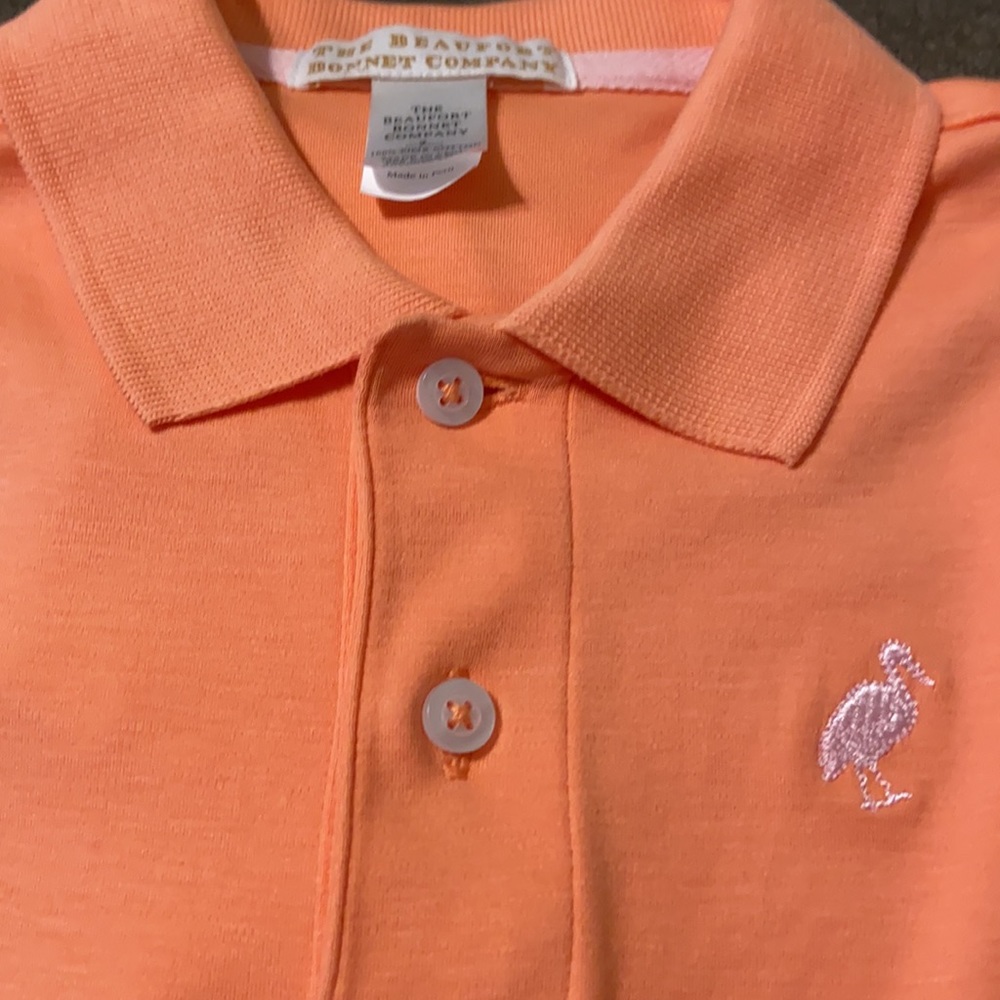 Salmon/peach boys polo shirt